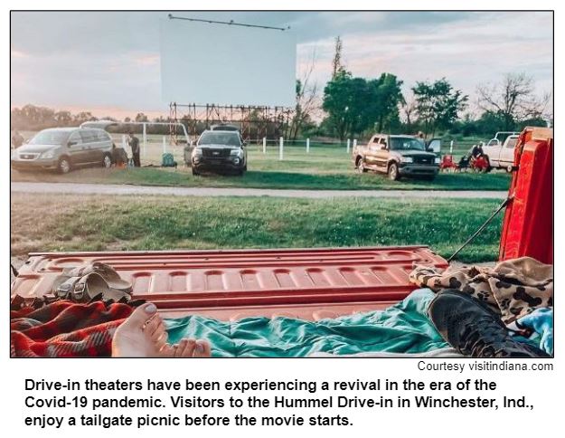 Drive-in theaters have been experiencing a revival in the era of the Covid-19 pandemic. Visitors to the Hummel Drive-in in Winchester, Ind., enjoy a tailgate picnic before the movie starts. Courtesy visitindiana.com
